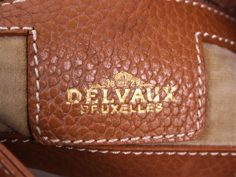 Sold at Auction: Bruin/grijs lederen handtas in struisvogel Delvaux