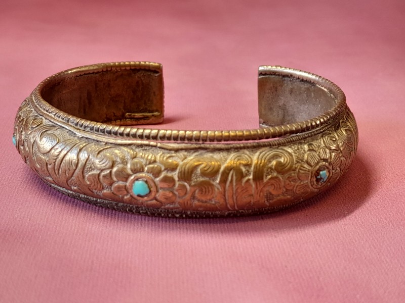 Set van een armband en ketting met hanger met turquoise inleg