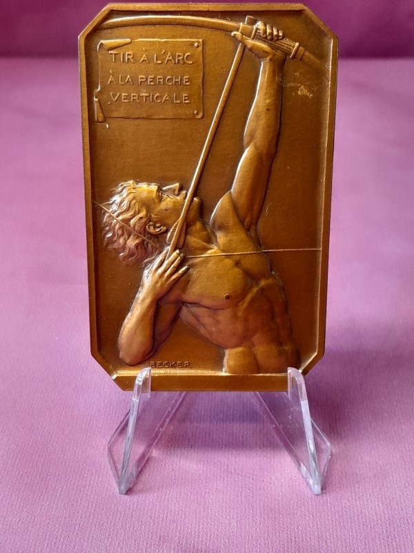 Bronzen medaille: Tir à l'arc à la peche verticale - Beckers