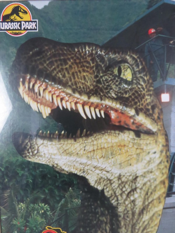 2 posters Jurassic Park in metalen kader achter glas