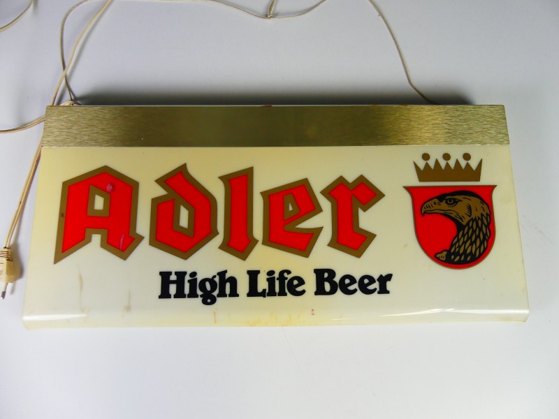 Vintage – lichtpubliciteit – Het bier Adler