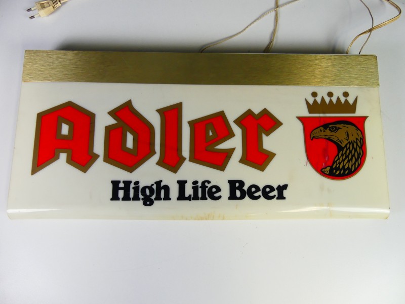 Vintage – lichtpubliciteit – Het bier Adler