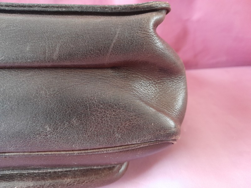 Vintage donker bruine handtas gelabeld Delvaux