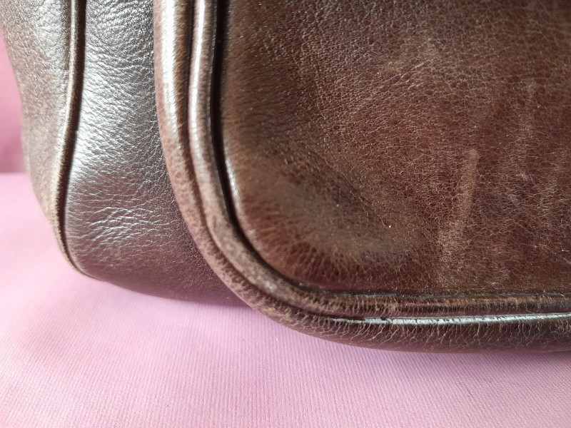 Vintage donker bruine handtas gelabeld Delvaux