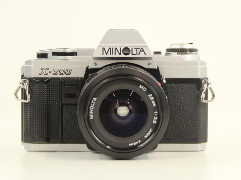 Minolta X-300 fotocamera chroom + 3 lenzen
