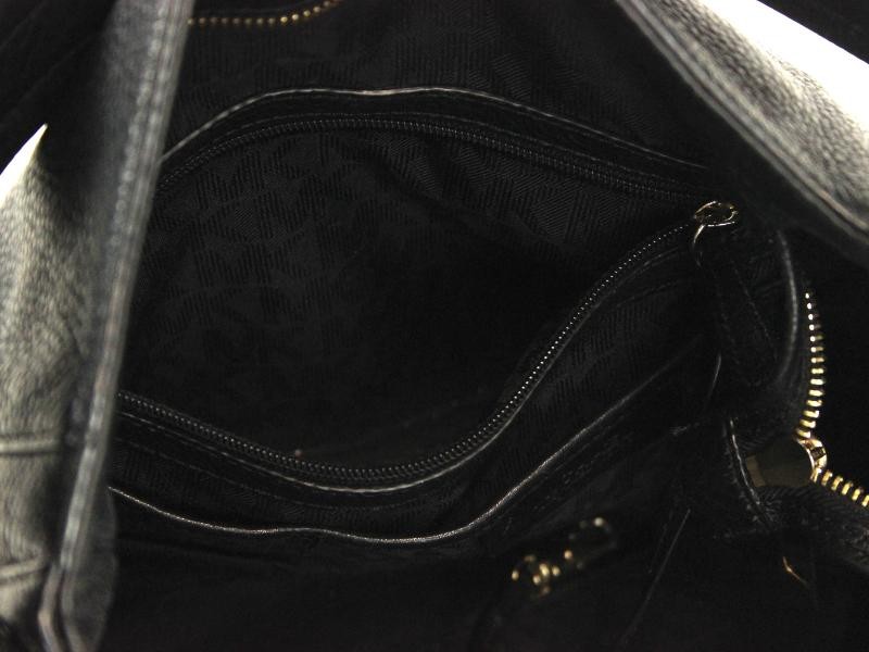 Mooie zwart lederen, vintage handtas gemerkt Michael Kors