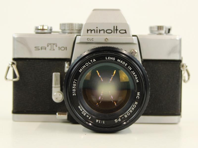 Vintage Minolta SRT 101 met 3 bijhorende lenzen en in de originele draagtas