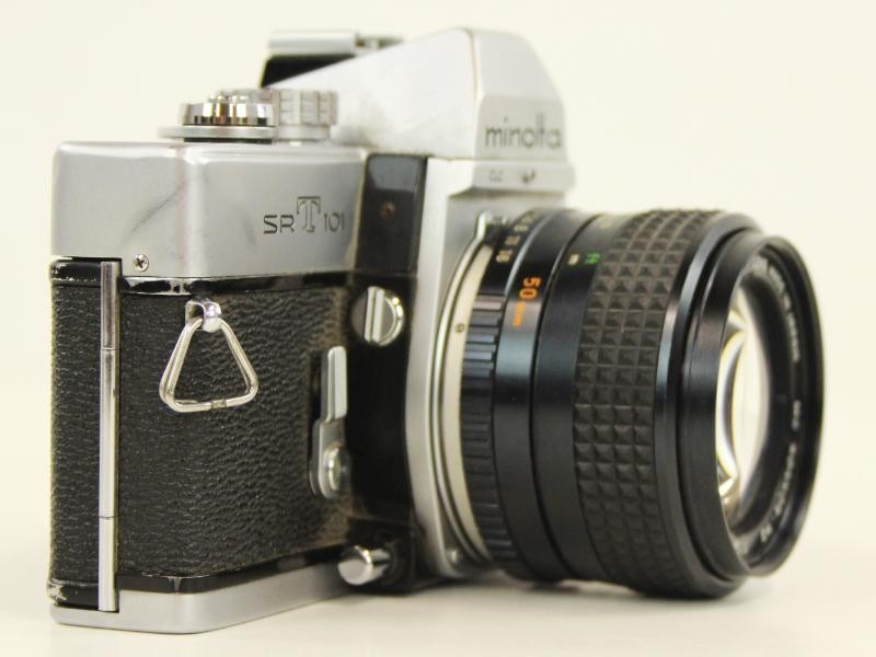 Vintage Minolta SRT 101 met 3 bijhorende lenzen en in de originele draagtas