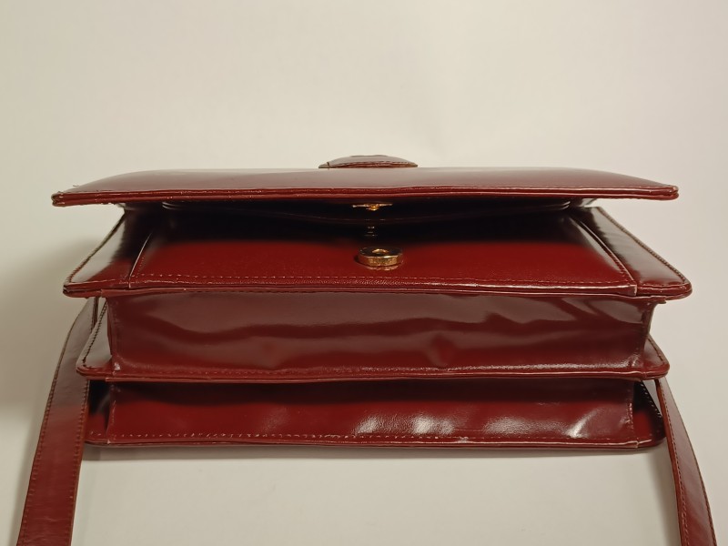 Vintage bordeaux Cartier schoudertas met portefeuille, chequehouder en visitekaarthouder