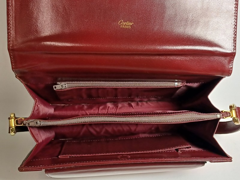 Vintage bordeaux Cartier schoudertas met portefeuille, chequehouder en visitekaarthouder