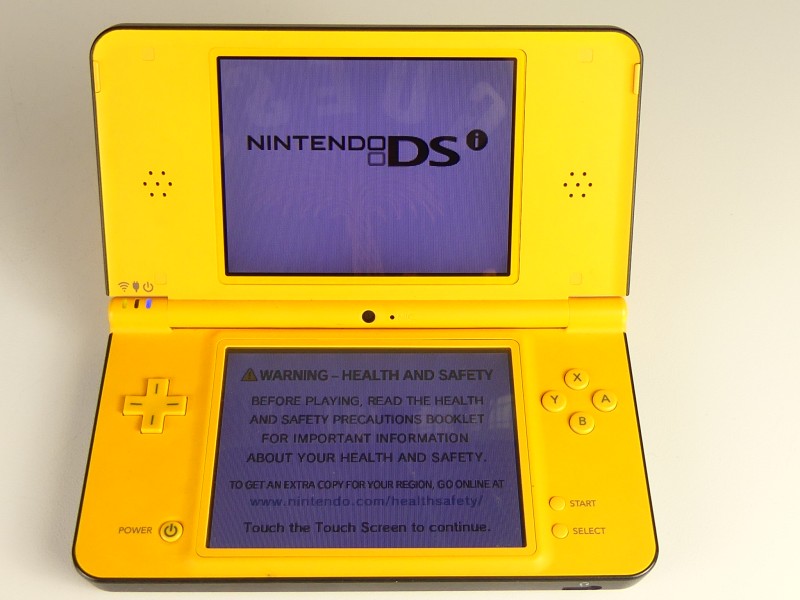 Nintendo DSi XL + 3 Lego DS spellen