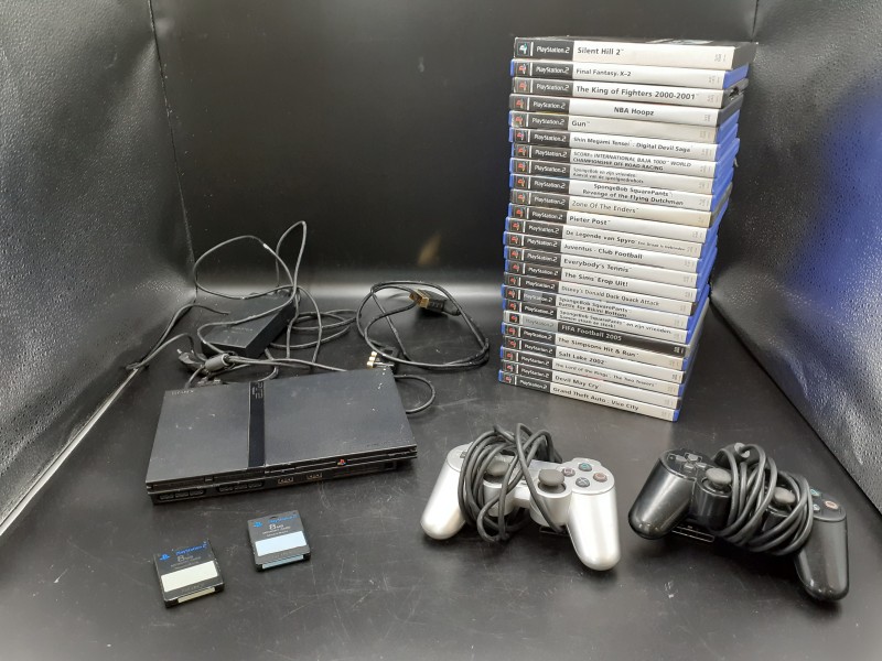 PlayStation 2 (compleet) + 2 controllers + 24 games