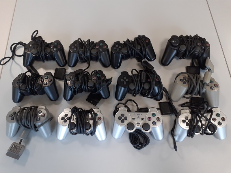 12 PlayStation 2 controllers + 3 Xbox 360 controllers